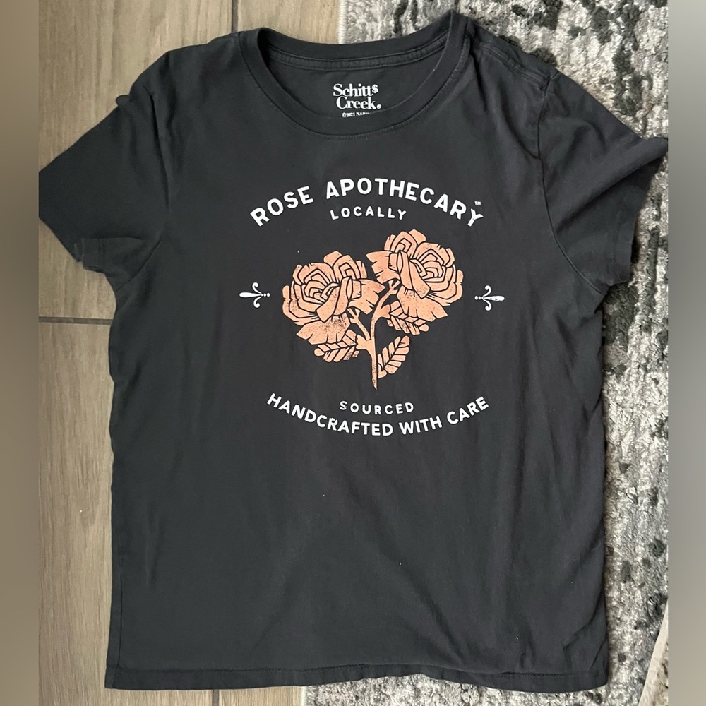 Rose Apothecary Schitt$ Creek Graphic Tee